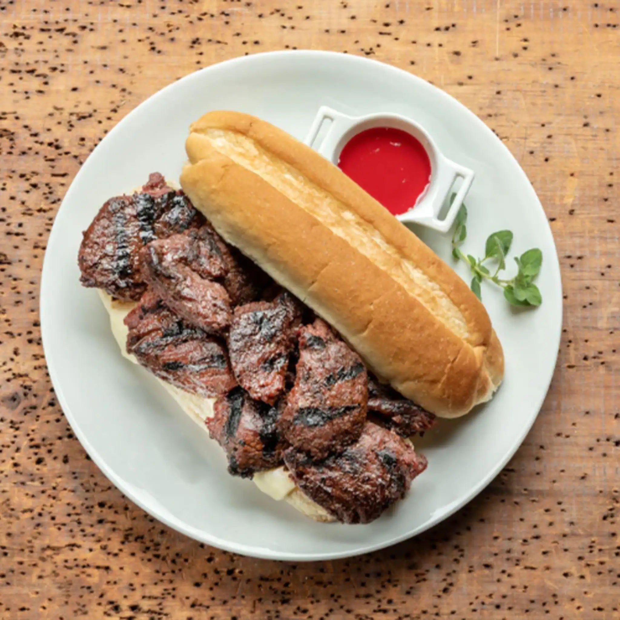 Dom's Original Steak Tips on a roll