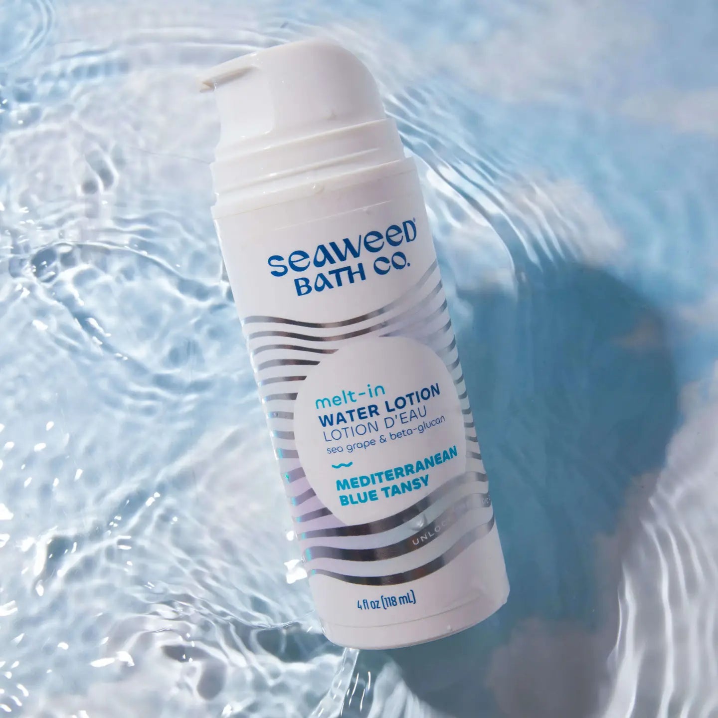 Seaweed Bath Co Melt-in Water Lotion bottle in water