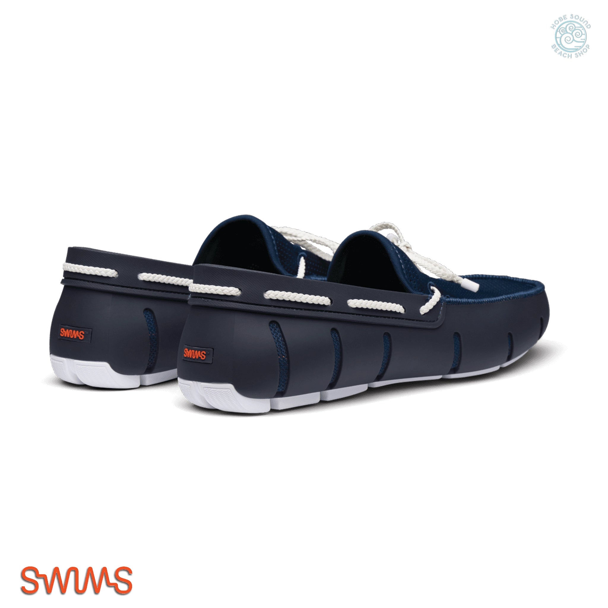 Navy blue and white Swims Loafers shoes back view on a white background