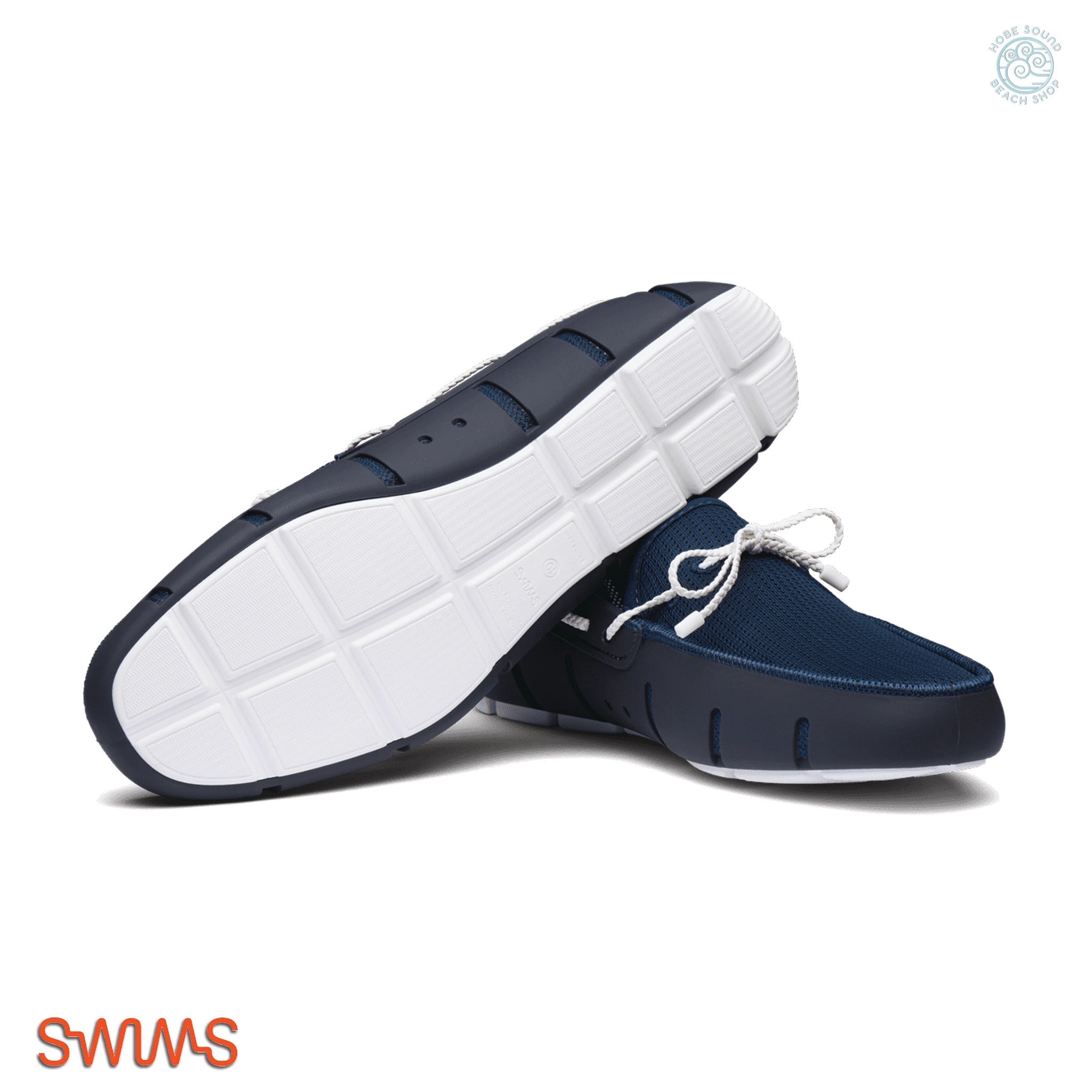 Navy blue and white Swims Loafers on a white background