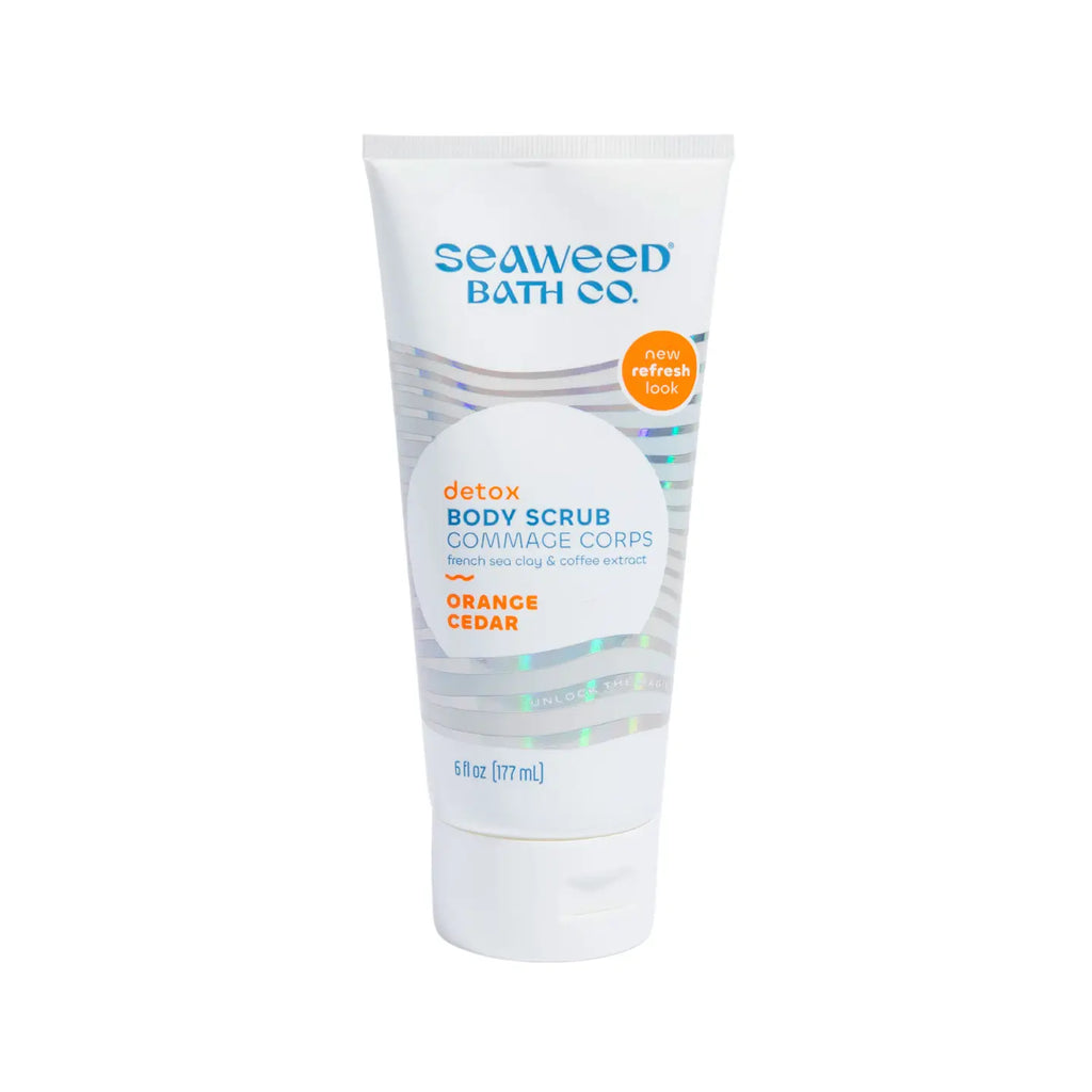 Orange Cedar Seaweed Bath Co. detox body scrub on a white background